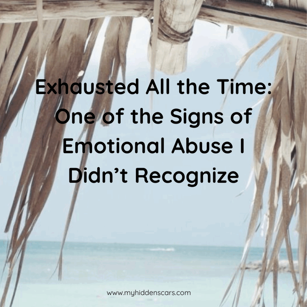 A beach scene with a thatched roof in the foreground and text about exhaustion as one of the signs of emotional abuse overlaid on the image.