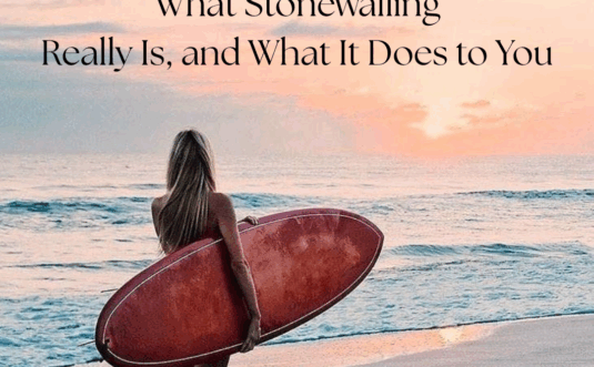 A woman with long hair holds a surfboard and stands on a beach at sunset; text above discusses the impact of stonewalling in abusive relationships.